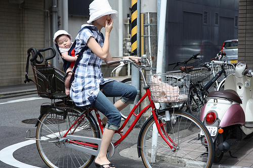 mommy with kid in bike